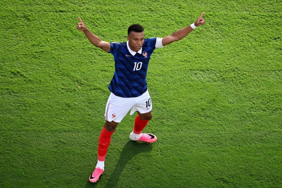 France's forward #10 Kylian Mbappe celebrates scoring his team's third goal during the 2026 World Cup round of 32 football match between France and Sweden at the New York/New Jersey Stadium in East Rutherford on June 30, 2026.   MAURO PIMENTEL / AFP
