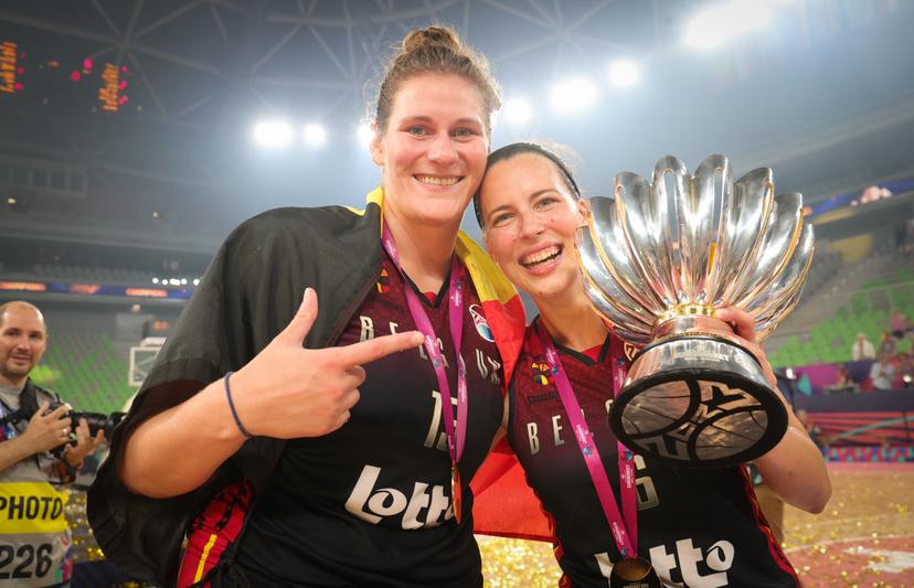 Belgium's Kyara Linskens and Belgium's Antonia Delaere pose with the trophy during celebrations after the Belgian Cats won the final basketball game and became European champion for the first time, after the final between Belgian national women's team 'the Belgian Cats' and Spain, in Ljubljana, Slovenia on Sunday 25 June 2023, at the FIBA Women EuroBasket 2023 European Championships in Israel and Slovenia. It is the first final ever for Belgium. BELGA PHOTO VIRGINIE LEFOUR