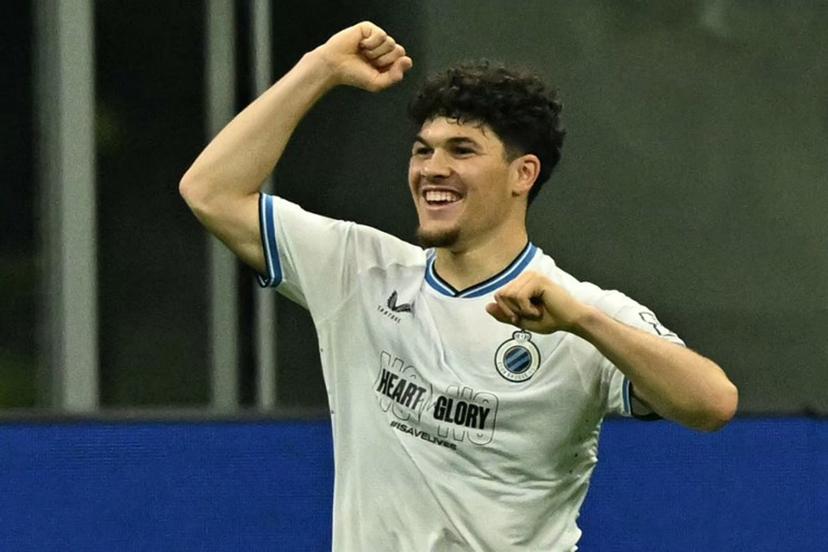 Club Brugge's Belgian defender #64 Kyriani Sabbe celebrates scoring his team's first goal during the Champions League football match between AC Milan and Club Brugge at the San Siro stadium in Milan on October 22, 2024.  Gabriel BOUYS / AFP