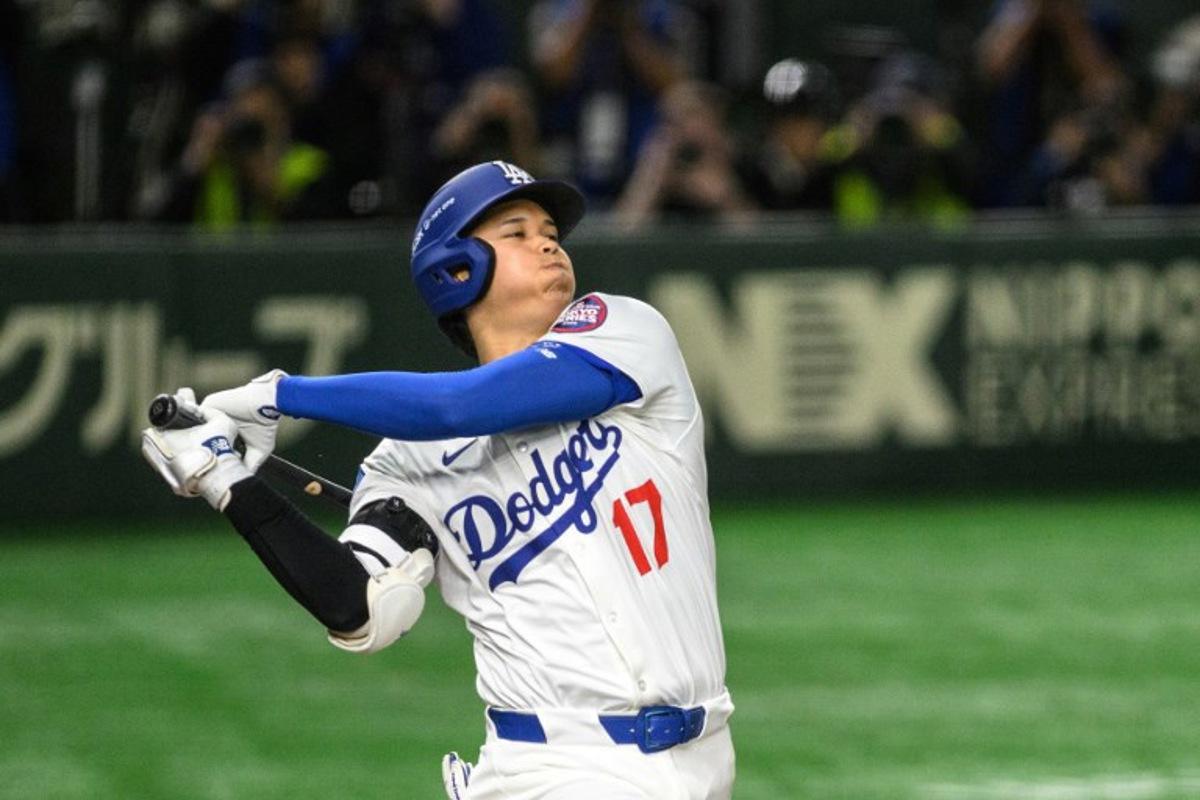 LA Dodgers' Shohei Ohtani bats during the baseball game between the Los Angeles Dodgers and Chicago Cubs in the MLB Tokyo Series at the Tokyo Dome in Tokyo on March 19, 2025.  Philip FONG / AFP