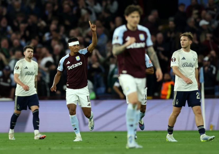 Aston Villa's English striker #11 Ollie Watkins celebrates scoring the opening goal during the UEFA Europa League, semi-final second-leg football match between Aston Villa and Nottingham Forest at Villa Park in Birmingham, central England on May 7, 2026.  Darren Staples / AFP
