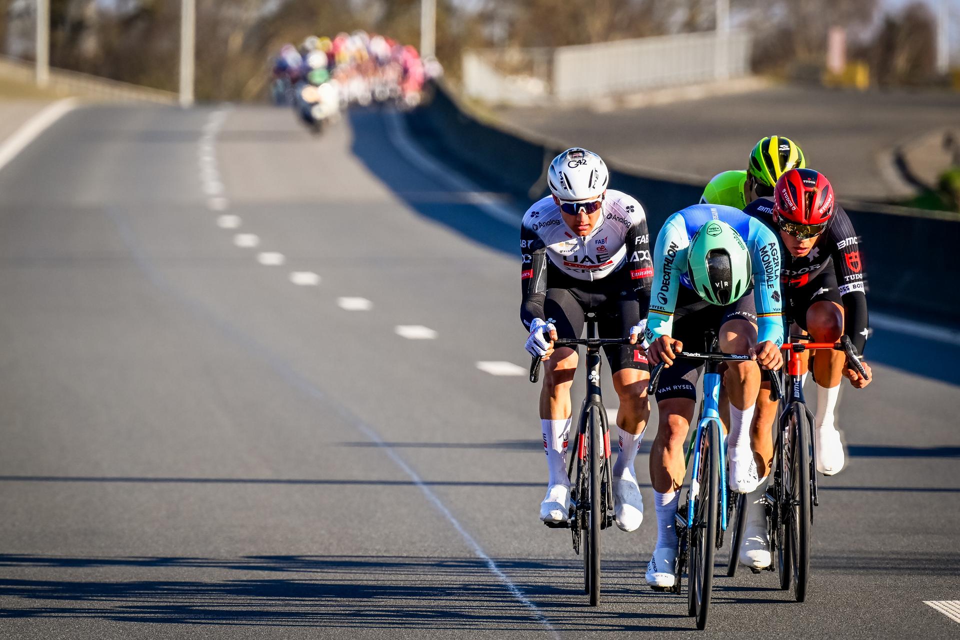 Belgian Dries De Bondt of Decathlon AG2R La Mondiale Team, Belgian Tim Wellens of UAE Team Emirates and Belgian Criel Desal of Wagner Bazin WB pictured in action during the Kuurne-Brussels-Kuurne one day cycling race, 196,9 km from Kuurne to Kuurne via Brussels, Sunday 02 March 2025. BELGA PHOTO DIRK WAEM