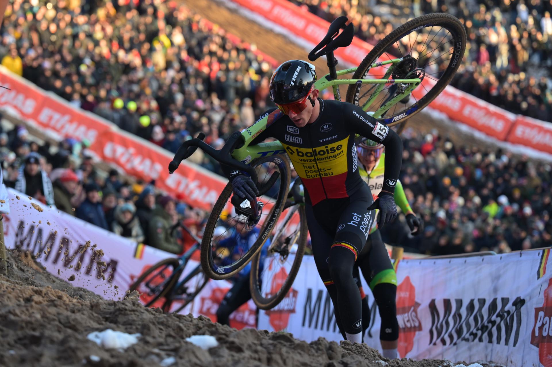 Belgian Thibau Nys pictured in action with lot of people around during the men's elite race at the World Cup cyclocross cycling event in Zonhoven on Sunday 04 January 2026, stage 9 (out of 12) of the UCI World Cup competition. BELGA PHOTO DAVID PINTENS