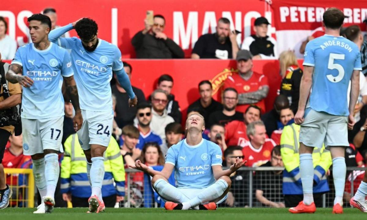 Manchester City's Norwegian striker #09 Erling Haaland celebrates scoring the team's first goal during the English Premier League football match between Manchester United and Manchester City at Old Trafford in Manchester, north west England, on September 13, 2026.  Paul ELLIS / AFP