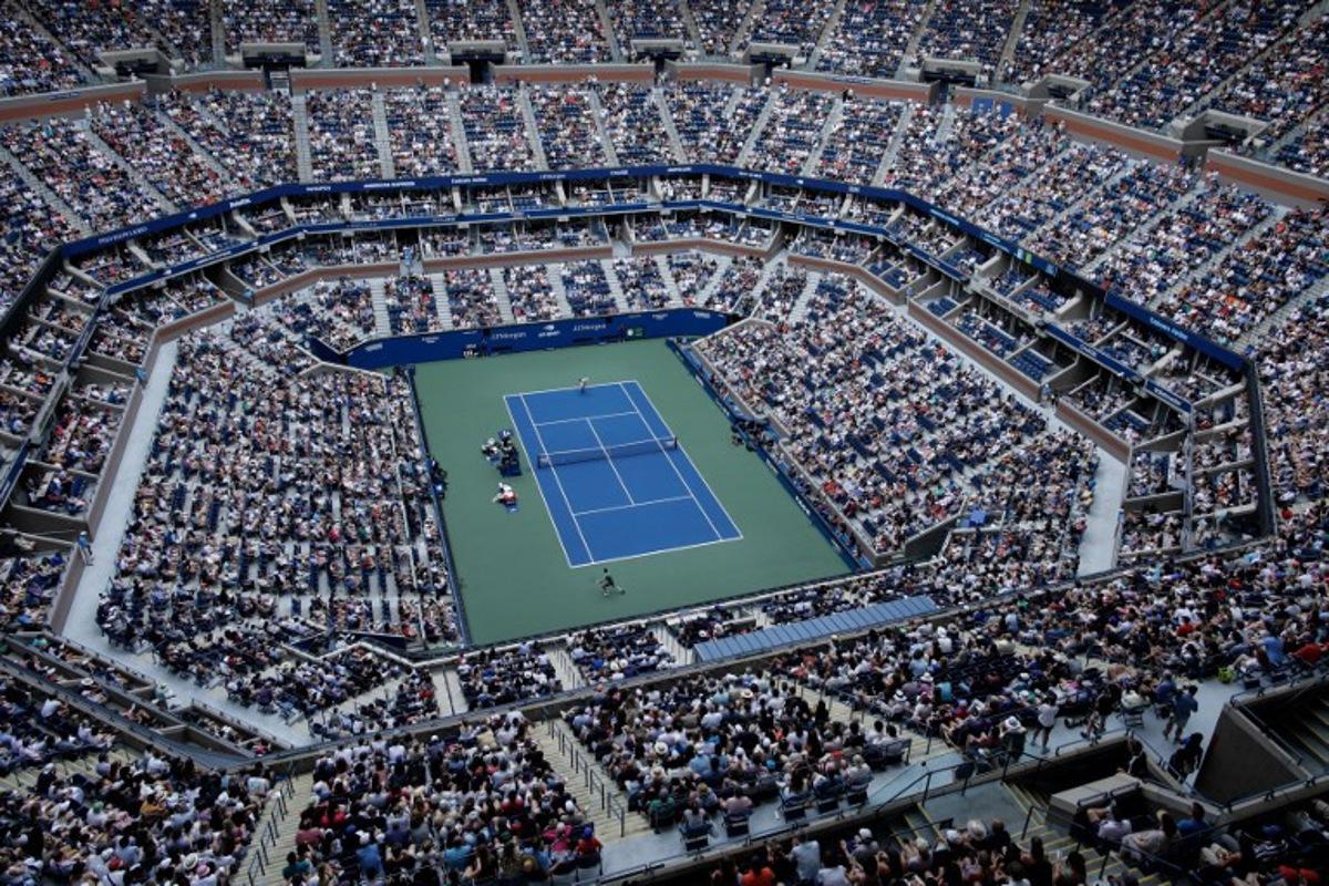 An overall view inside Arthur Ashe Stadium as Italy's Jannik Sinner and Australia's Christopher O'Connell play during their men's singles third round match on day six of the US Open tennis tournament at the USTA Billie Jean King National Tennis Center in New York City, on August 31, 2024.  KENA BETANCUR / AFP