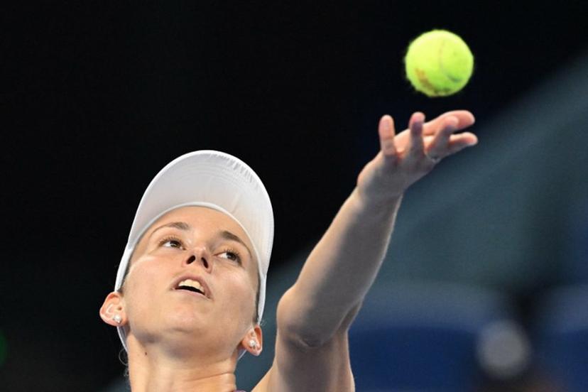 Belgium's Elise Mertens hits a return to Poland's Iga Swiatek during their women's singles quarter-final at the China Open tennis tournament in Beijing on October 9, 2026.  Greg Baker / AFP