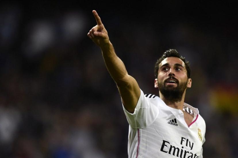 Real Madrid's defender Alvaro Arbeloa celebrates after scoring a goal during the Spanish league football match Real Madrid CF vs UD Almeria at the Santiago Bernabeu stadium in Madrid on April 29, 2015.   AFP PHOTO/ JAVIER SORIANO  Javier SORIANO / AFP