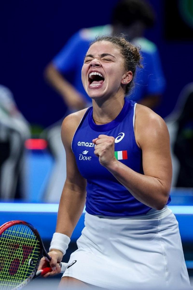 Italy's Jasmine Paolini reacts as she plays against Ukraine's Elina Svitolina during their second singles semi-final match at the Billie Jean King Cup in Shenzhen, southern China's Guangdong province on September 19, 2025.  STR / AFP