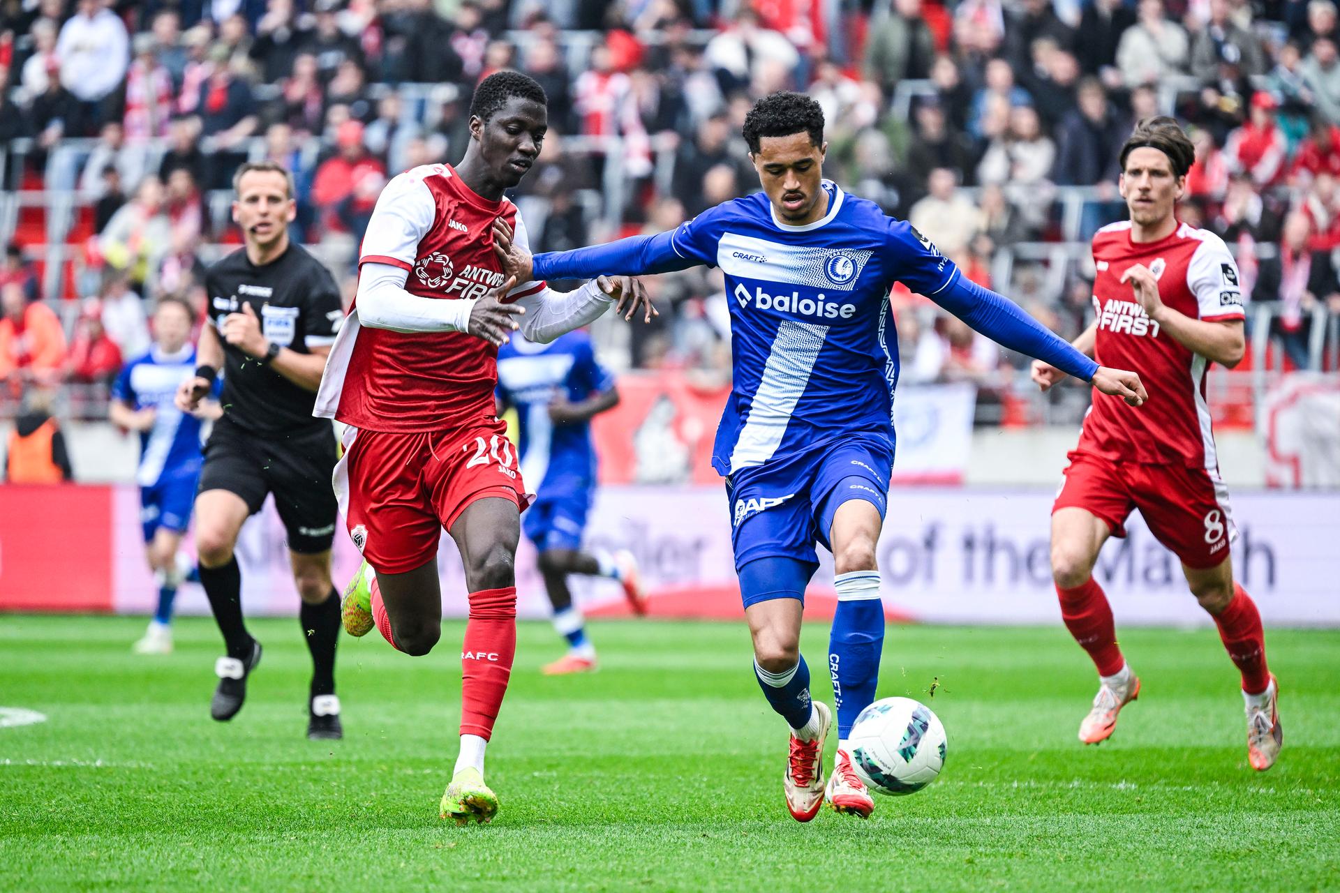 Antwerp's Mahamadou Doumbia and Gent's Aime Omgba pictured in action during a soccer match between Royal Antwerp FC and KAA Gent, Sunday 13 April 2025 in Antwerpen, on day 3 (out of 10) of the Champions' Play-offs of the 2024-2025 'Jupiler Pro League' first division of the Belgian championship. BELGA PHOTO TOM GOYVAERTS