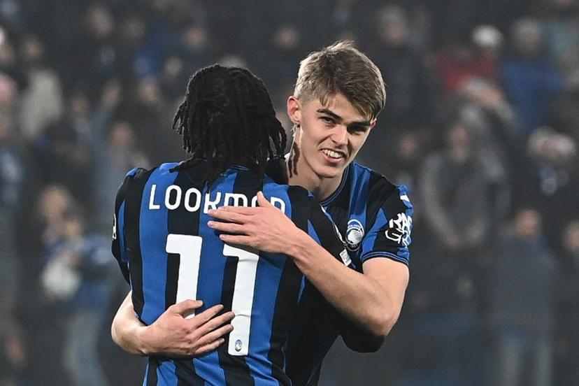 Atalanta's Nigerian forward #11 Ademola Lookman celebrates with Atalanta's Belgian midfielder #17 Charles De Ketelaere after scoring his team's fourth goal during the UEFA Champions League football match between Atalanta and Sturm Graz at the Gewiss Stadium in Bergamo, on January 21, 2025.  Isabella BONOTTO / AFP