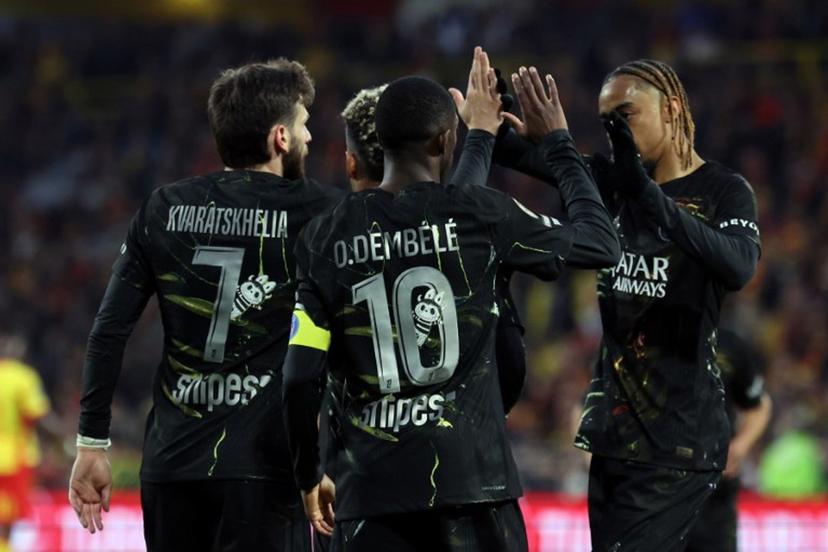Paris Saint-Germain's Georgian forward #07 Khvicha Kvaratskhelia (L) is congratulated by Paris Saint-Germain's French forward #10 Ousmane Dembele (C) and Paris Saint-Germain's French forward #29 Bradley Barcola after scoring a goal during the French L1 football match between RC Lens and Paris Saint-Germain (PSG) at the Stade Bollaert-Delelis stadium in Lens on May 13, 2026.  Francois LO PRESTI / AFP