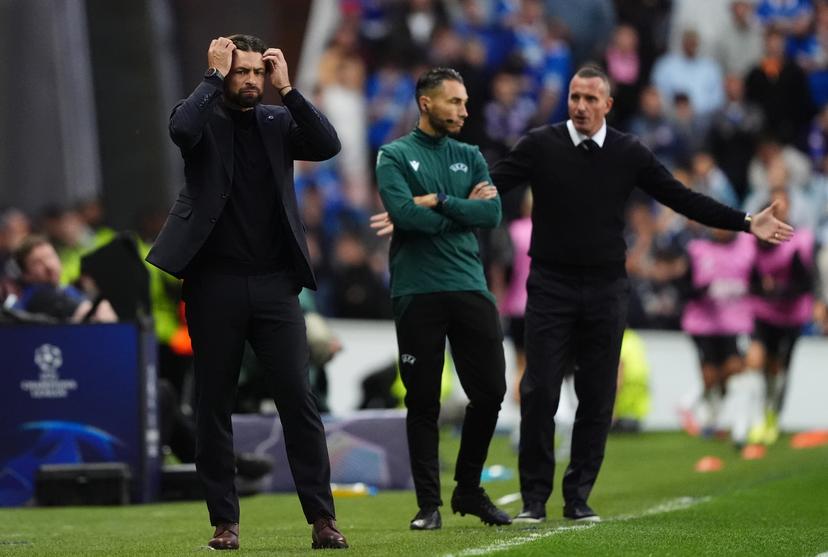 Rangers manager Russell Martin (left) and Club Brugge manager Nicky Hayen (right) during the UEFA Champions League, play-off, first leg match at Ibrox Stadium, Glasgow. Picture date: Tuesday August 19, 2025. BELGIUM ONLY