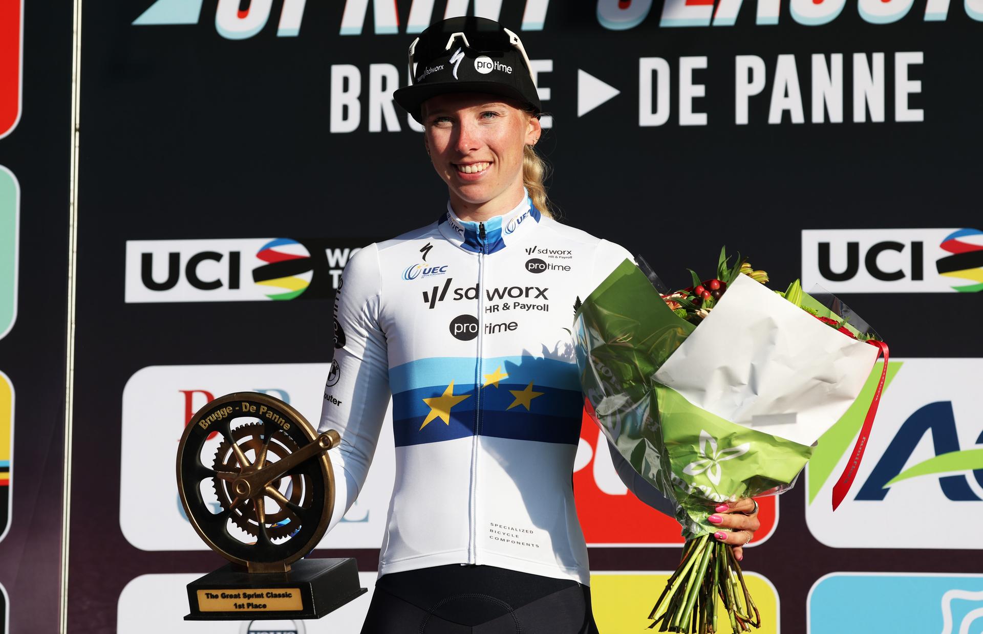 Dutch Lorena Wiebes of SD Worx-Protime celebrates on the podium after winning the 'Classic Brugge-De Panne' women's elite one-day cycling race, 152,7 km from Brugge to De Panne, Thursday 27 March 2025. BELGA PHOTO KURT DESPLENTER