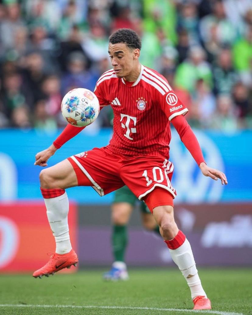 Bayern Munich's German midfielder #10 Jamal Musiala plays the ball during the German first division Bundesliga football match between VfL Wolfsburg and FC Bayern Munich in Wolfsburg, on May 9, 2026.  Ronny HARTMANN / AFP
