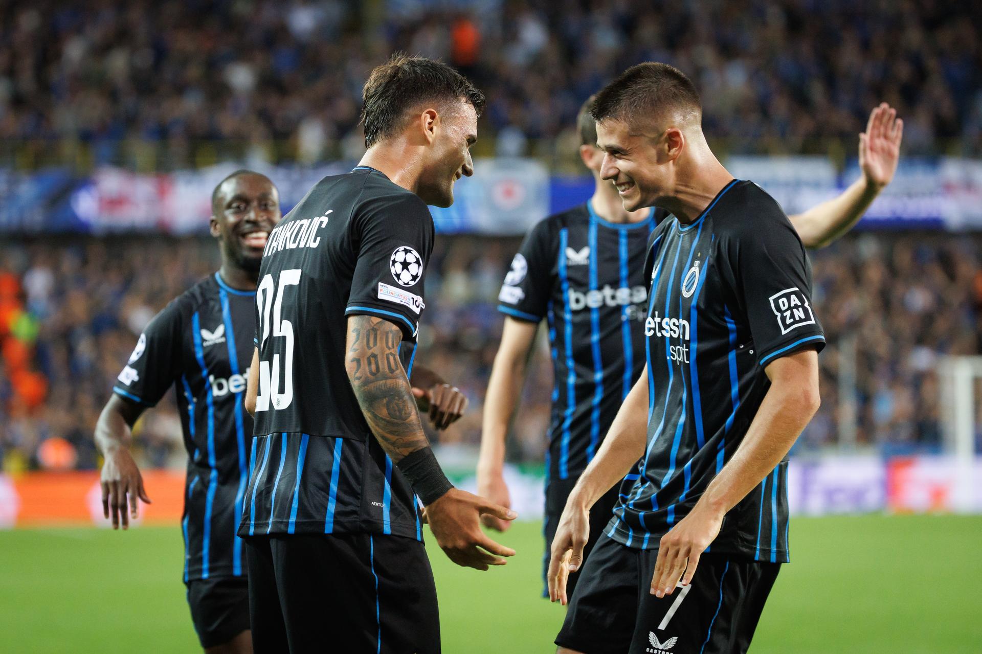 Club's Aleksandar Stankovic and Club's Nicolo Tresoldi celebrate after scoring during a soccer game between Belgian Club Brugge KV and Scottish Glasgow Rangers F.C., Wednesday 27 August 2025 in Brugge, the return leg of the play-offs for the Champions League tournament. Club won the first leg 1-3. BELGA PHOTO KURT DESPLENTER