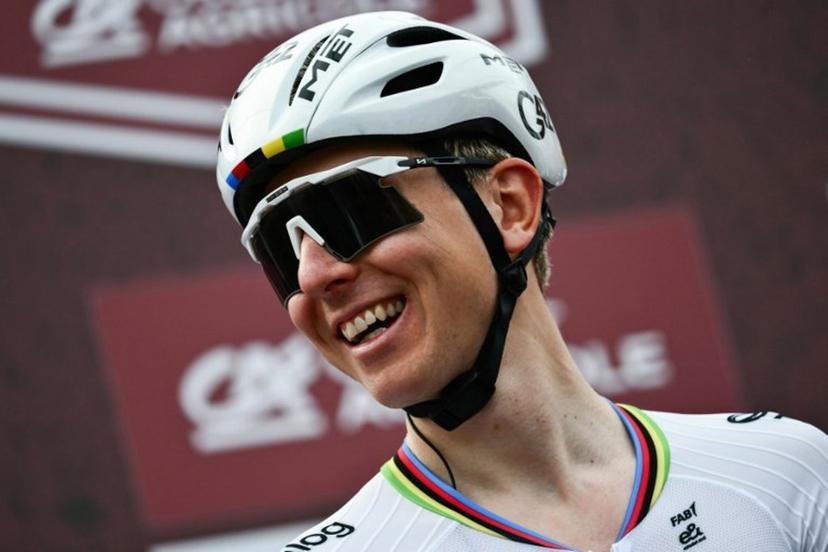 UAE Team Emirates's Slovenian Tadej Pogacar smiles ahead of the 20th one-day classic 'Strade Bianche' (White Roads) men's cycling race between Siena and Siena in Tuscany on March 7, 2026.  Marco BERTORELLO / AFP