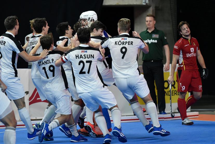 Austrian players celebrate after winning the hockey match between Belgium and Austria, the finals of the EuroHockey Indoor Championship, in Antwerp, Sunday 14 January 2018. BELGA PHOTO JOHN THYS
