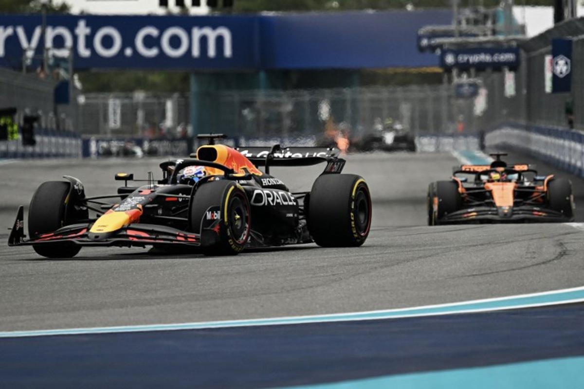 Red Bull Racing's Dutch driver Max Verstappen races ahead of McLaren's Australian driver Oscar Piastri during the 2025 Miami Formula One Grand Prix at Miami International Autodrome in Miami Gardens, Florida, on May 4, 2025.   Chandan Khanna / AFP