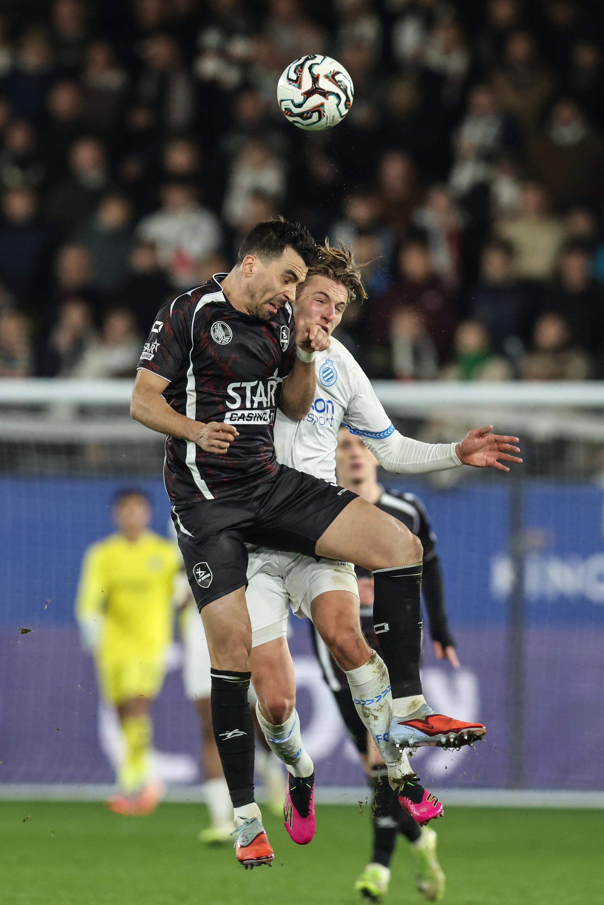 OHL's Noe Dussenne and Club's Romeo Vermant fight for the ball during a soccer game between Oud-Heverlee Leuven and Club Brugge KV, in the 1/8 final of the Croky Cup Belgian cup, Wednesday 03 December 2025 in Leuven. BELGA PHOTO BRUNO FAHY