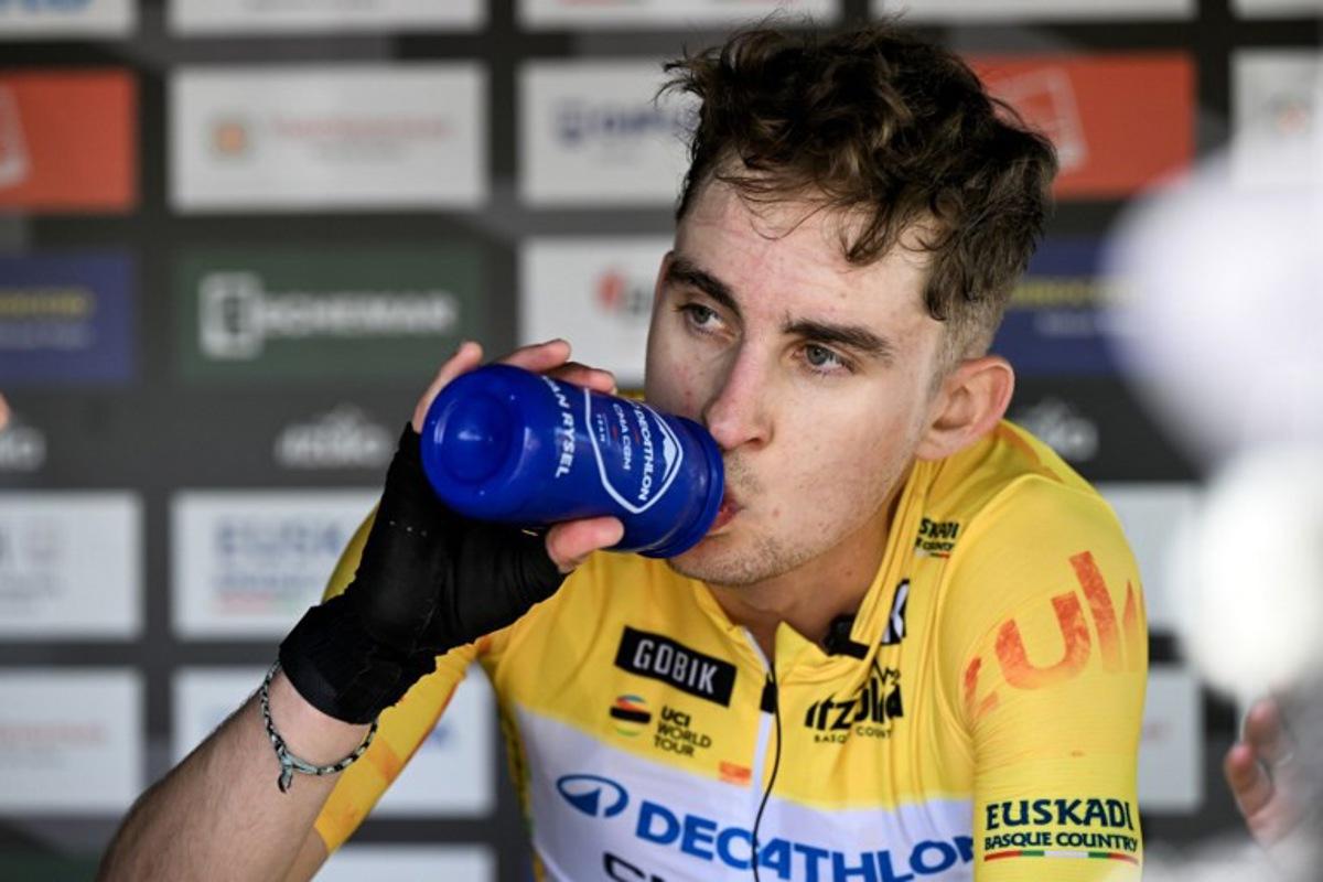 Overall race leader, Team Decathlon CMA CGM's French rider Paul Seixas, takes a drink after the fourth stage of the Basque Country's Itzulia cycling tour, a 167.2 km race starting and finishing in Galdakao, on April 9, 2026.   ANDER GILLENEA / AFP