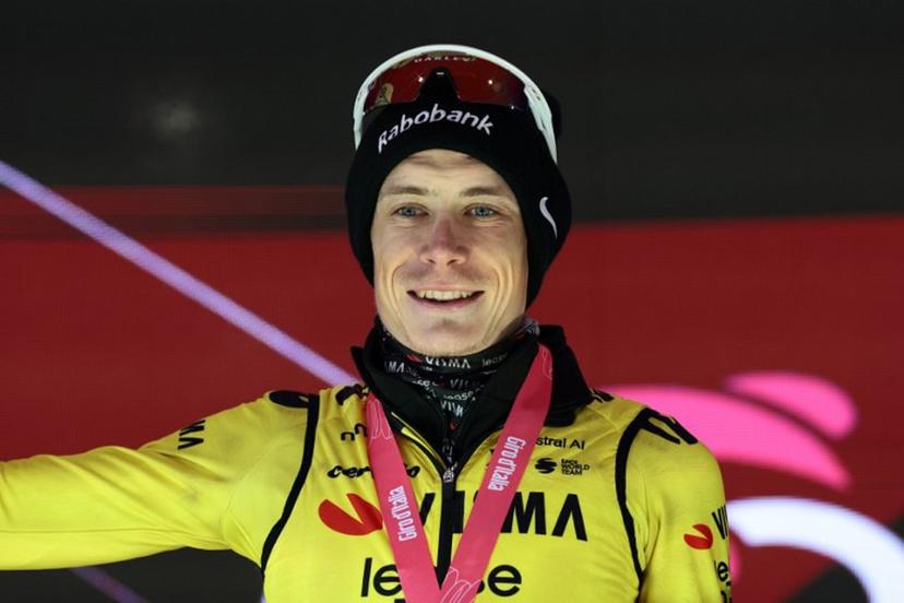 Team Visma Lease a Bike Danish rider Jonas Vingegaard, celebrates on the podium after winning the 9th stage of the Giro d'Italia 2026 - Tour of Italy cycling race between Cervia and Corno alle Scale, near Doganaccia, central Italy on May 17, 2026.  Luca Bettini / AFP