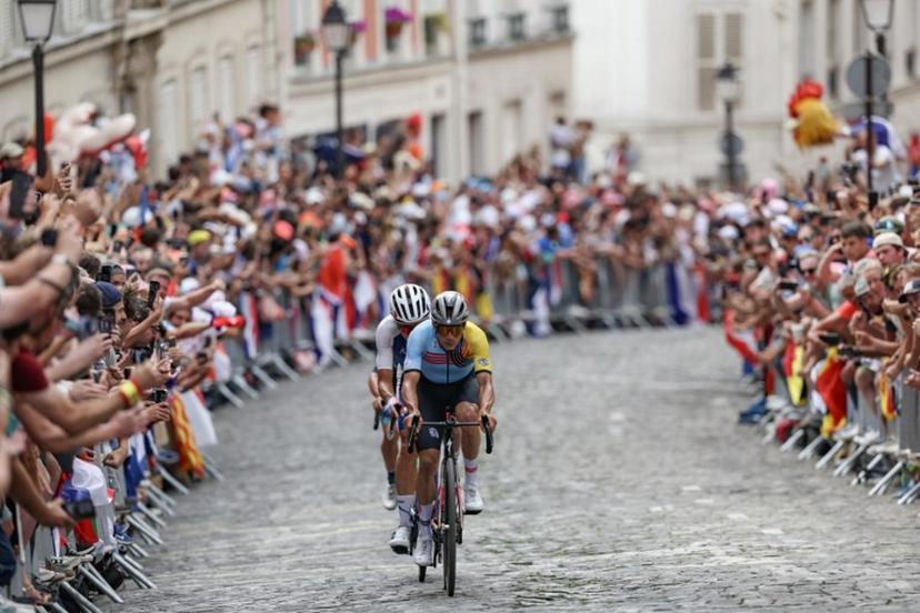 Belgium's Remco Evenepoel cycles ahead of France's Valentin Madouas in the Montmartre ascent during the men's cycling road race during the Paris 2024 Olympic Games in Paris, on August 3, 2024.  Tim De Waele / POOL / AFP