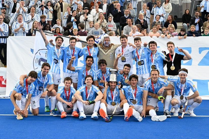 Gantoise's players celebrate after winning a hockey game between Gantoise and Woluwe, Sunday 03 May 2026 in Gent, in the Final of the Dr. Oetker Hockey Cup 2025-2026 tournament. BELGA PHOTO JILL DELSAUX