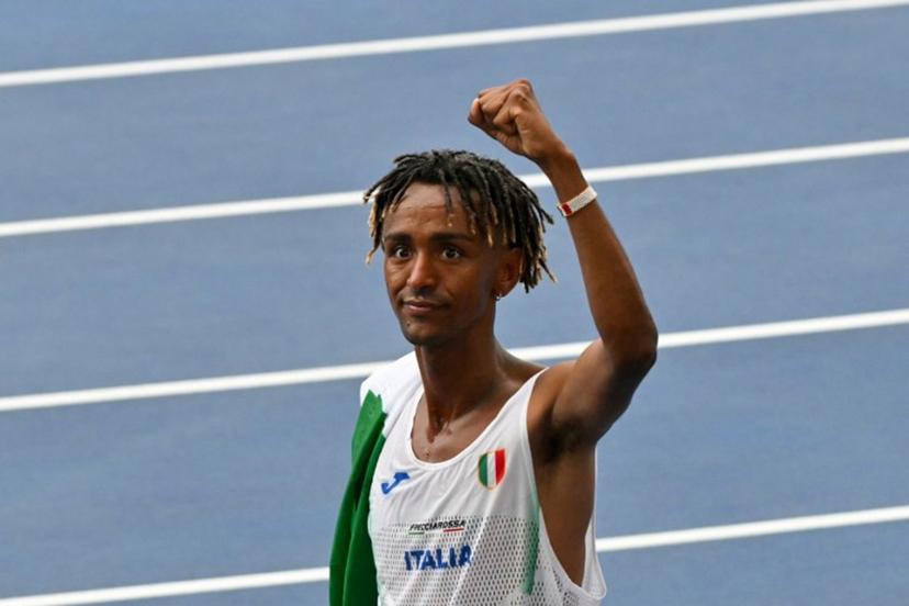 Italy's Yemaneberhan Crippa celebrates after winning the men's half marathon final during the European Athletics Championships at the Olympic stadium in Rome on June 9, 2024.  Andreas SOLARO / AFP