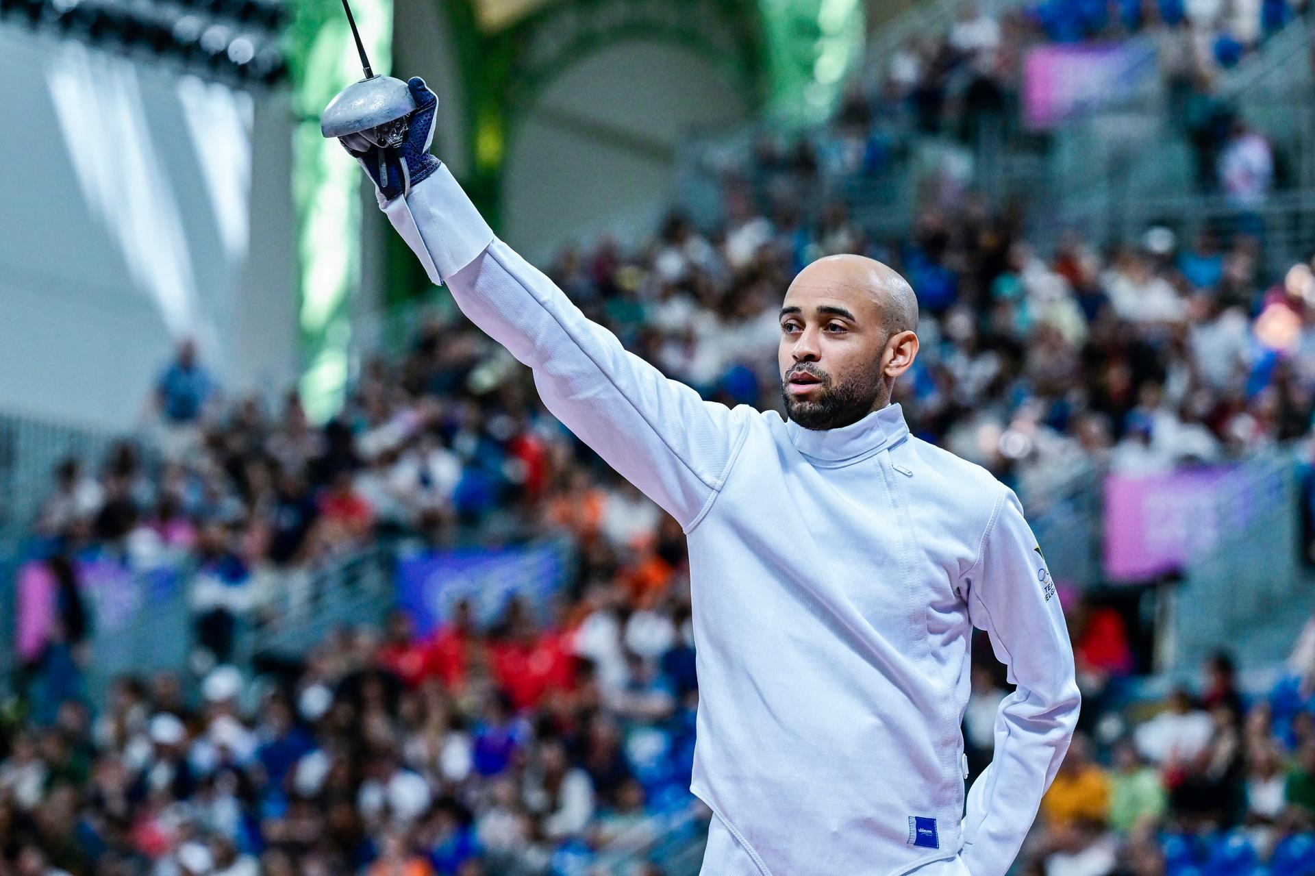 Belgian fencer Neisser Loyola pictured at the start of a fencing bout between Swiss Bayard and Belgian Loyola, in the table of 32 of the men's epee individual competition at the Paris 2024 Olympic Games, on Sunday 28 July 2024 in Paris, France. The Games of the XXXIII Olympiad are taking place in Paris from 26 July to 11 August. The Belgian delegation counts 165 athletes competing in 21 sports. BELGA PHOTO DIRK WAEM