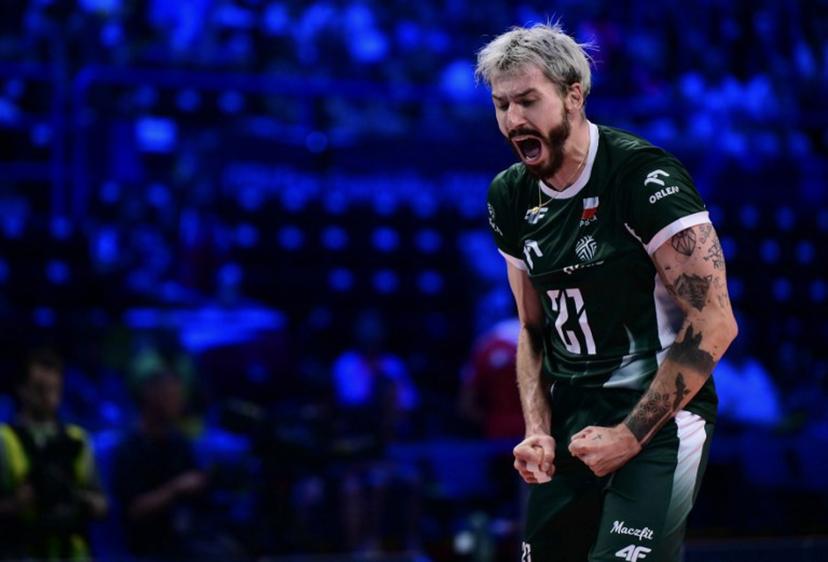 Poland's Opposite Hitter #21 Tomasz Fornal celebrates a point during the CEV EuroVolley 2026 men's semifinal volleyball match between Poland and Slovenia at the Forum of Assago, on September 25, 2026.  Marco BERTORELLO / AFP