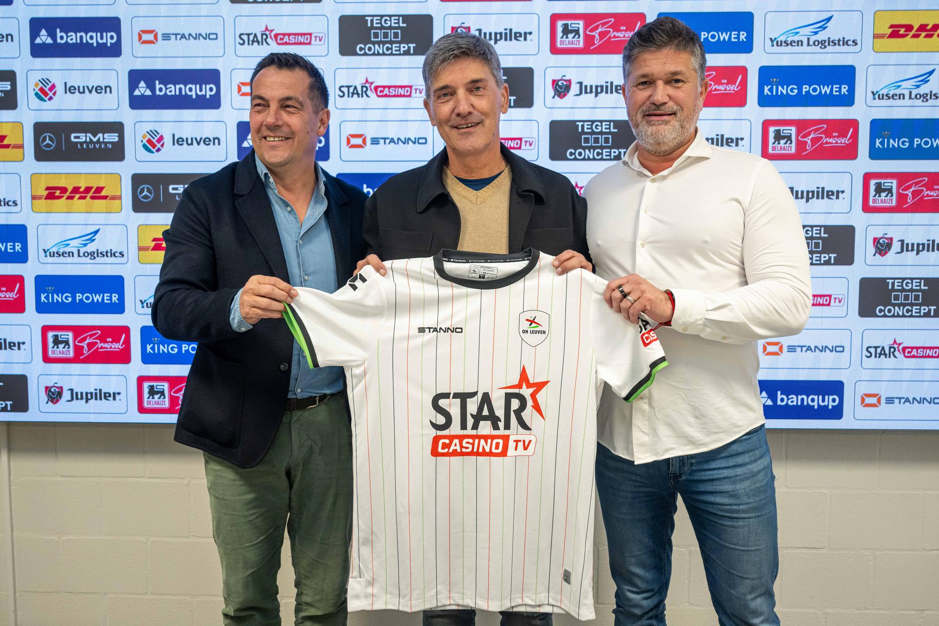 OHL's CEO Frederic Van den Steen, OHL's new head coach Felice Mazzu and OHL's technical director Gyorgy Csepregi pose for the photographer at a press conference of Belgian soccer team Oud-Heverlee Leuven to present their new head coach, Monday 27 October 2025 in Leuven. BELGA PHOTO JONAS ROOSENS