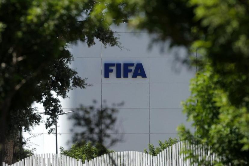 The FIFA logo is seen at its Africa regional office in Sale on August 5, 2026. President Gianni Infantino held emergency talks with other FIFA directors in Morocco on August 5, a source told AFP, amid a wave of criticism over his now shelved plan to open the World Cup to private investment. Abdelmajid BZIOUAT / AFP