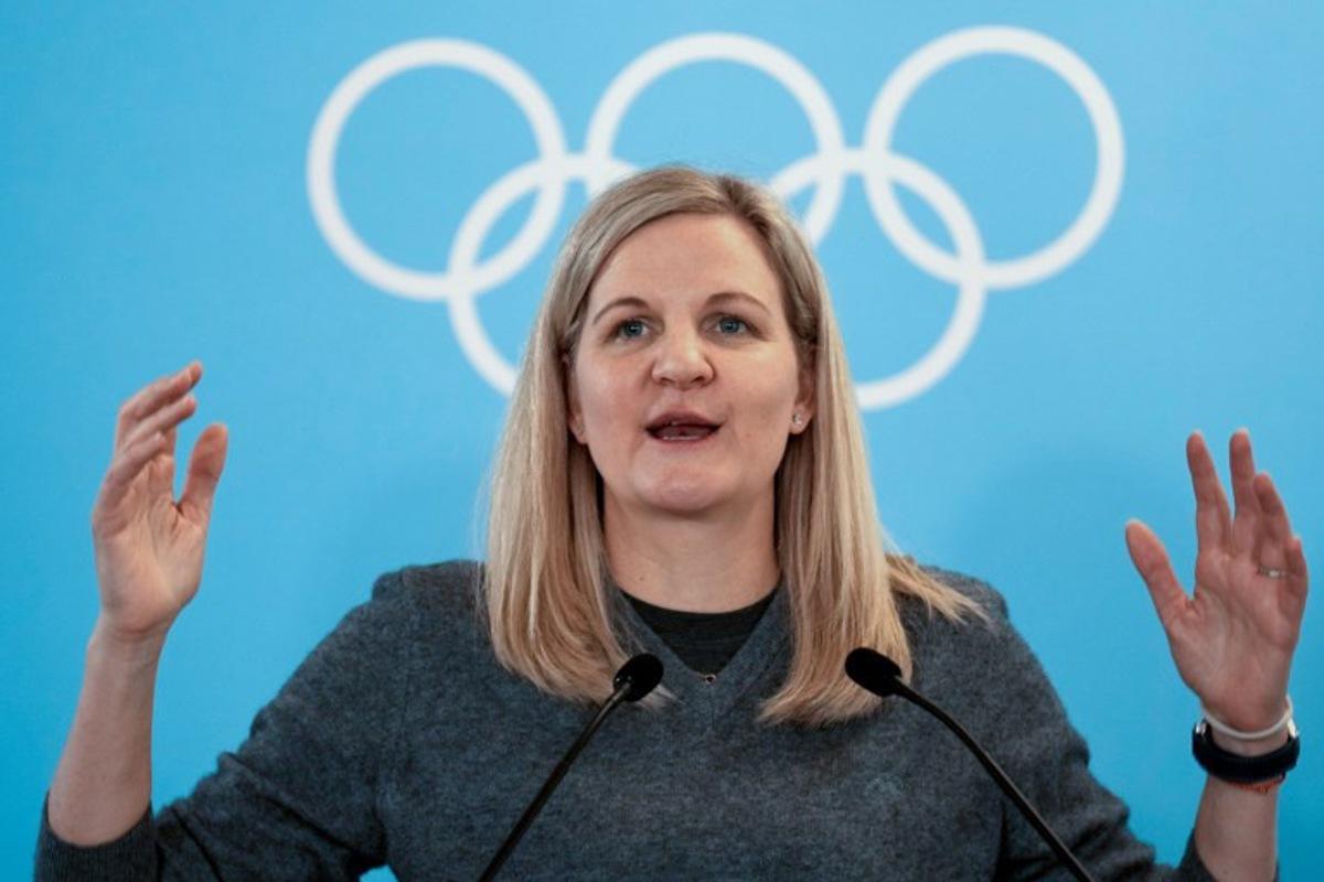 IOC President Kirsty Coventry gestures during the IOC session at the Milano Cortina 2026 Winter Olympic Games in Milan on February 22, 2026.  Luca Bruno / POOL / AFP