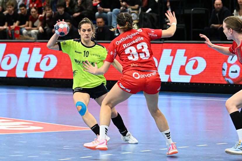 HB Sint-Truiden's Sara Marteleur and Eupen's Louise Rouselle pictured in action during a handball game between KTSV Eupen and HB Sint-Truiden, Saturday 04 April 2026, in Hasselt, the women's final of the Belgian handball cup. BELGA PHOTO JILL DELSAUX
