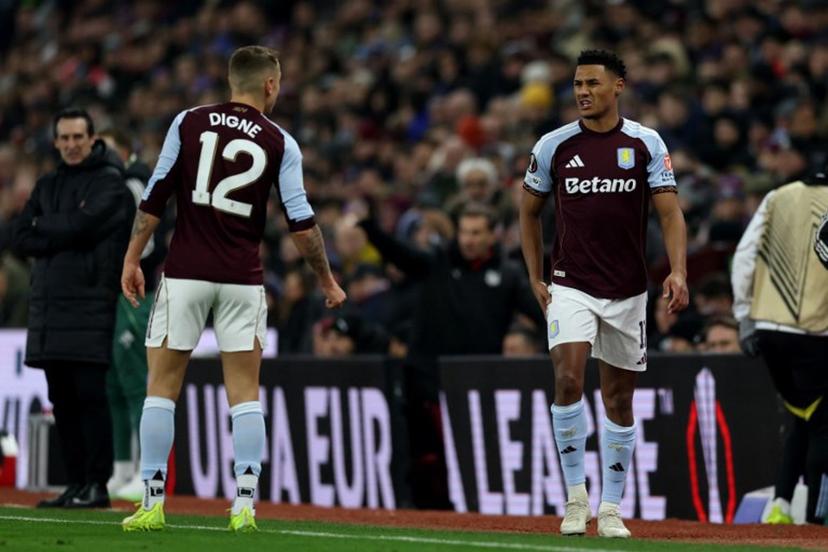 Aston Villa's French defender  #12 Lucas Digne talks to Aston Villa's English striker #11 Ollie Watkins (R) as he leaves the pitch with an injury during the UEFA Europa League league-stage football match between Aston Villa and RB Salzburg at Villa Park in Birmingham, central England on January 29, 2026.  Darren Staples / AFP