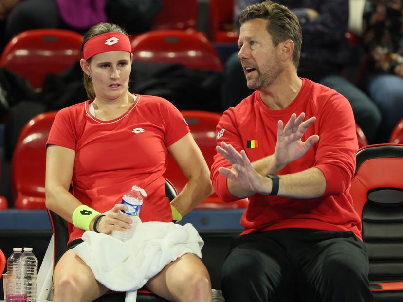 Belgian Greet Minnen and Belgian team captain Wim Fissette pictured during a tennis match between Belgian Minnen and Hungarian Galfi, the first rubber in the meeting between Belgium and Hungary in the Play-Offs for the Billie Jean King Cup tennis, on Saturday 11 November 2023 in Charleroi. BELGA PHOTO BENOIT DOPPAGNE