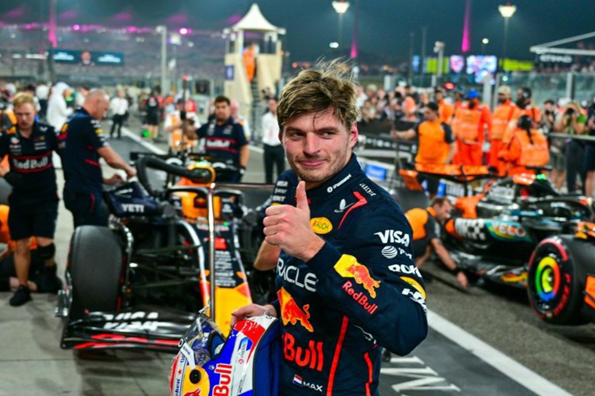 Red Bull Racing's Dutch driver Max Verstappen reacts after taking the pole position at the end of the qualifying session ahead of the Abu Dhabi Formula One Grand Prix at the Yas Marina Circuit in Abu Dhabi on December 6, 2025.  Andrej ISAKOVIC / AFP
