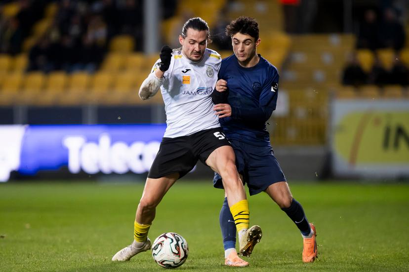 Lokeren's Sam Van Aerschot and Jong Genk's Luca Oyen pictured during a soccer game between KSC Lokeren and Jong Genk, Sunday 14 December 2025 in Lokeren, on day 17 of the 2025-2026 'Challenger Pro League' 1B second division of the Belgian championship. BELGA PHOTO KRISTOF VAN ACCOM