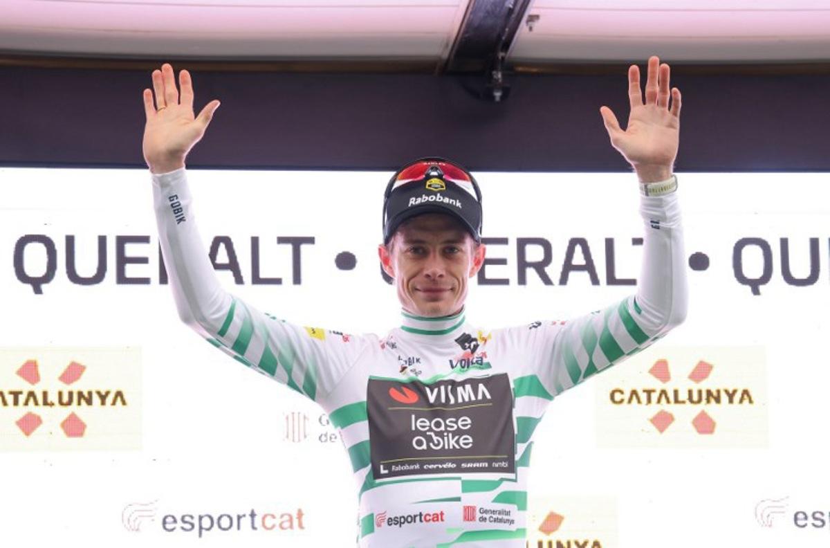 Team Visma-Lease a bike's Danish rider Jonas Vingegaard celebrates on the podium after winning the sixth stage of the 2026 'Volta a Catalunya' cycling tour of Catalonia, a 158 km race between Berga and the Sanctuary of La Mare de Deu de Queralt in Berga, on March 28, 2026.  Josep LAGO / AFP