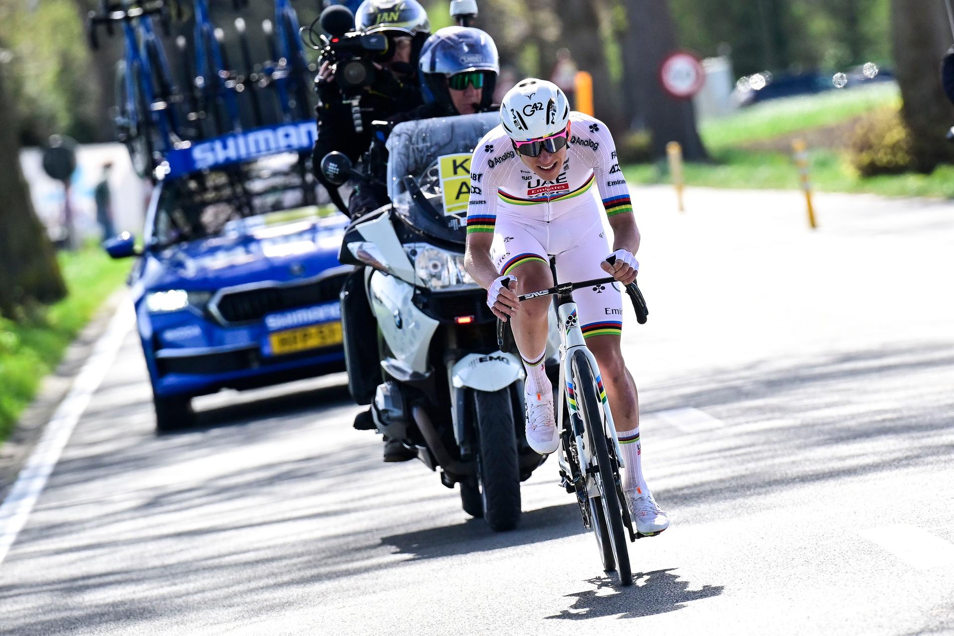 Slovenian Tadej Pogacar of UAE Team Emirates pictured in action solo in the final stretch during the men's race of the 'Ronde van Vlaanderen/ Tour des Flandres/ Tour of Flanders' one day cycling race, 268,9km from Brugge to Oudenaarde, Sunday 06 April 2025. BELGA PHOTO DIRK WAEM