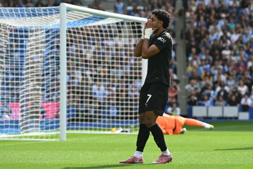 Manchester City's Egyptian striker #07 Omar Marmoush reacts to a missed chance during the English Premier League football match between Brighton and Hove Albion and Manchester City at the American Express Community Stadium in Brighton, southern England on August 31, 2025.  JUSTIN TALLIS / AFP