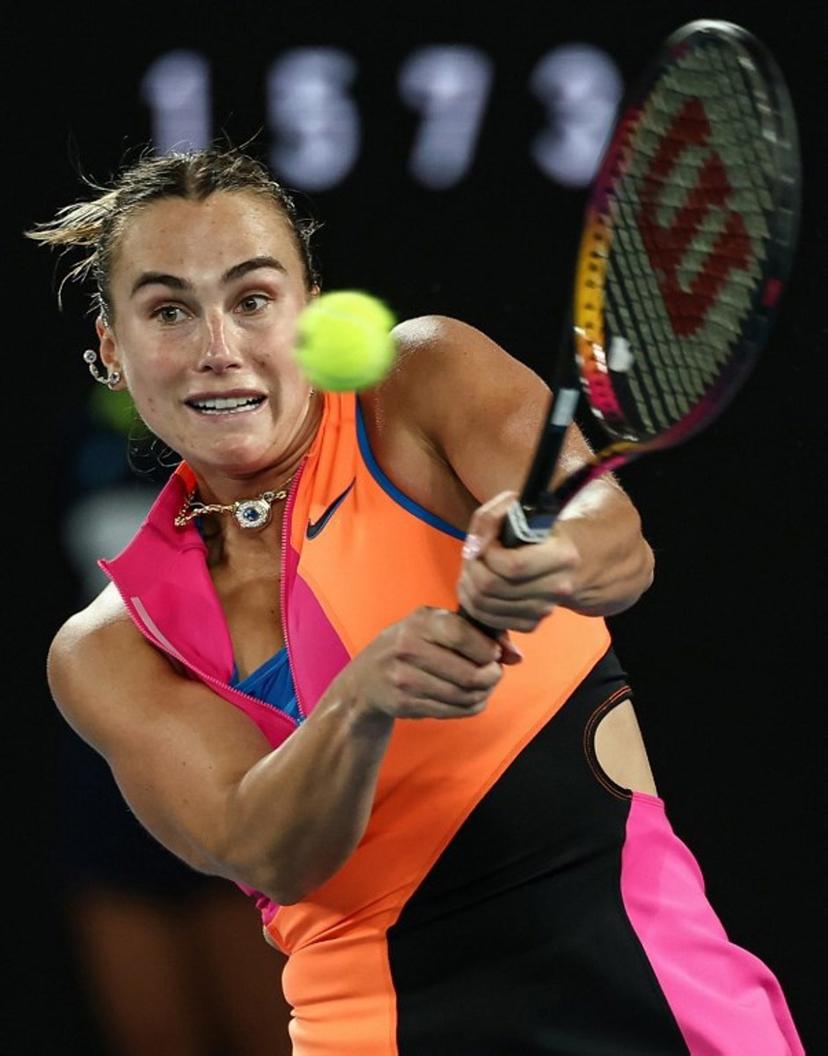 Belarus' Aryna Sabalenka hits a return against Kazakhstan's Elena Rybakina during their women's singles final match on day fourteen of the Australian Open tennis tournament in Melbourne on January 31, 2026.  IZHAR KHAN / AFP