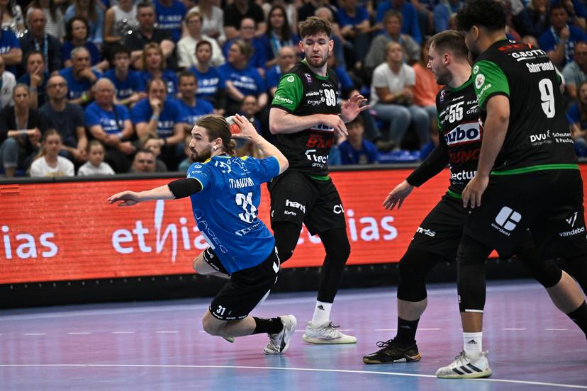 Bocholt's Pieter Strauven fights for the ball during a handball game between Hubo handbal Hasselt and Achilles Bocholt, Saturday 19 April 2025, in Hasselt, the men's final of the Belgian handball cup. BELGA PHOTO JOHAN EYCKENS