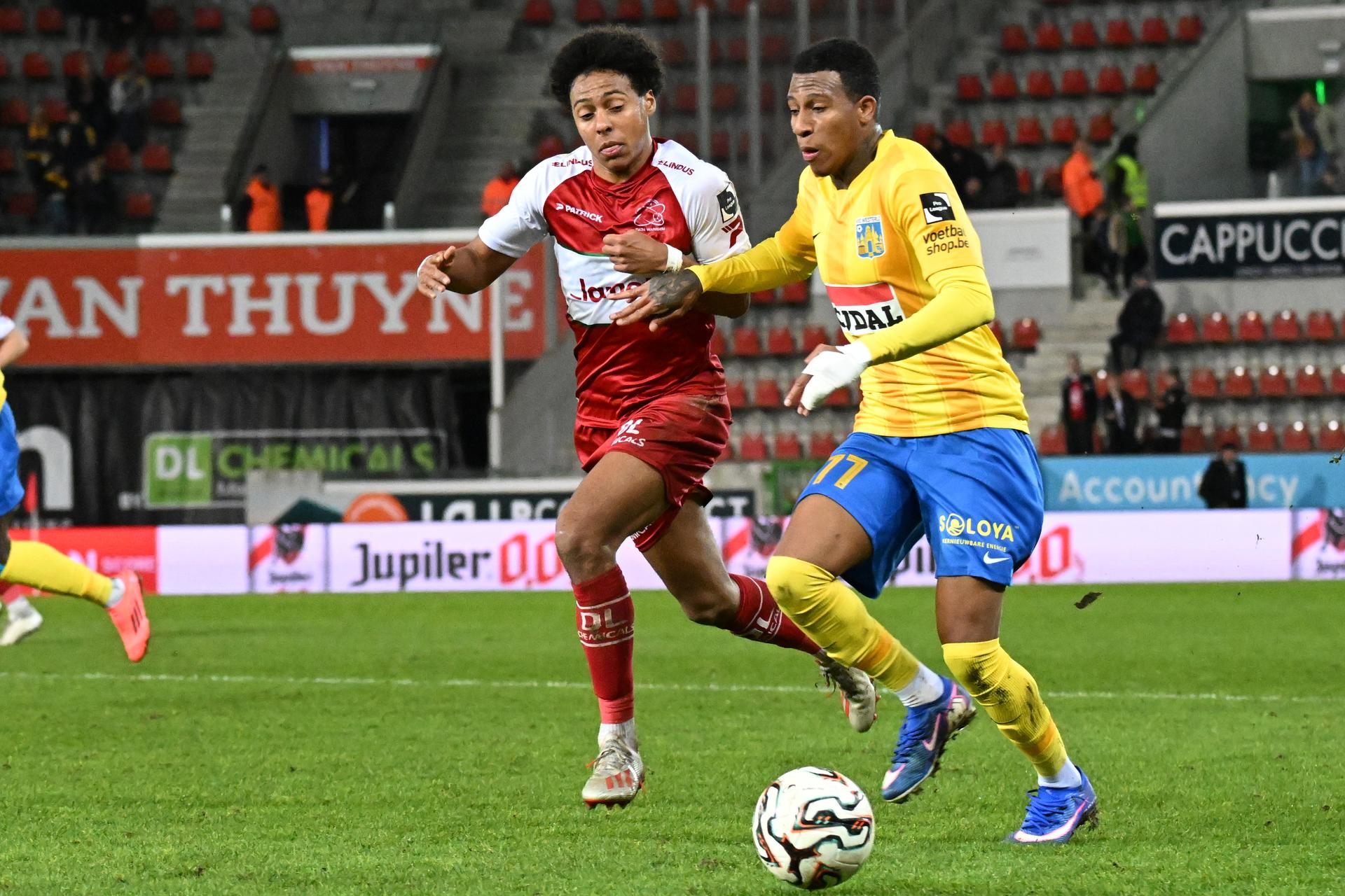 Essevee's Marley Ake and Westerlo's Josimar Alcocer fight for the ball during a soccer match between SV Zulte Waregem and KVC Westerlo, Saturday 31 January 2026 in Waregem, on day 23 of the 2025-2026 'Jupiler Pro League' first division of the Belgian championship. BELGA PHOTO MAARTEN STRAETEMANS
