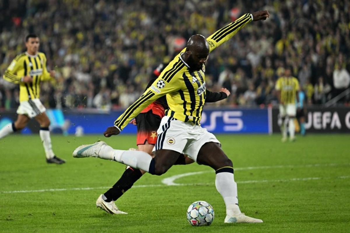 Fenerbahce's Belgian forward #09 Romelu Lukaku shoots the ball during the UEFA Champions League first round day 3 football match between Fenerbahce and Slavia Prague at the Fenerbahce Sukru Saracoglu Spor Kompleksi stadium in Istanbul on October 20, 2026.  OZAN KOSE / AFP