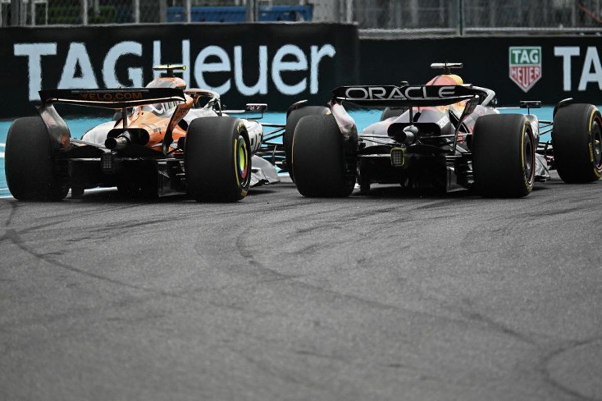 (L-R) McLaren's British driver Lando Norris and Red Bull Racing's Dutch driver Max Verstappen race during the 2025 Miami Formula One Grand Prix at Miami International Autodrome in Miami Gardens, Florida, on May 4, 2025.   Chandan Khanna / AFP