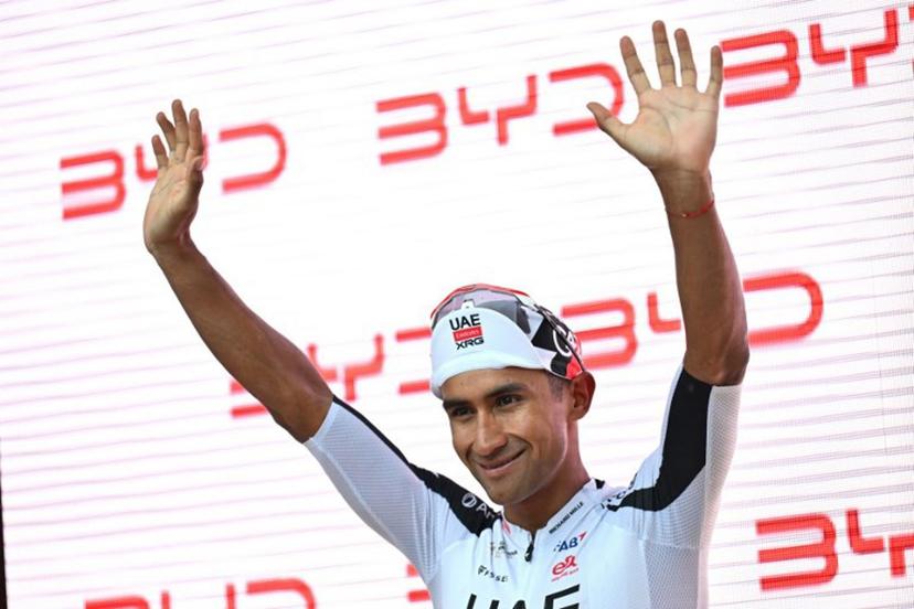 UAE Team Emirates-XRG's Ecuadorian rider Jhonatan Narvaez celebrates on the podium after winning the third stage, 157,4 km from Bad Ragaz to Bad Ragaz, of the Men's Tour of Switzerland (Tour de Suisse) cycling race in Bad Ragaz on June 19, 2026.  HAROLD CUNNINGHAM / AFP
