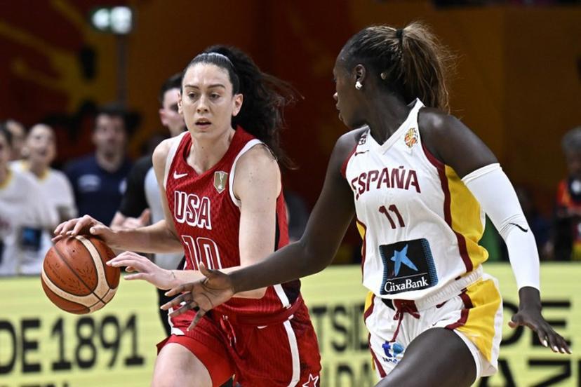 USA's power forward #10 Breanna Stewart and Spain's center #11 Awa Fam vie for the ball during the 2026 FIBA Women's Basketball World Cup semi-final match between Spain and the United States in Berlin on September 12, 2026.  Tobias SCHWARZ / AFP