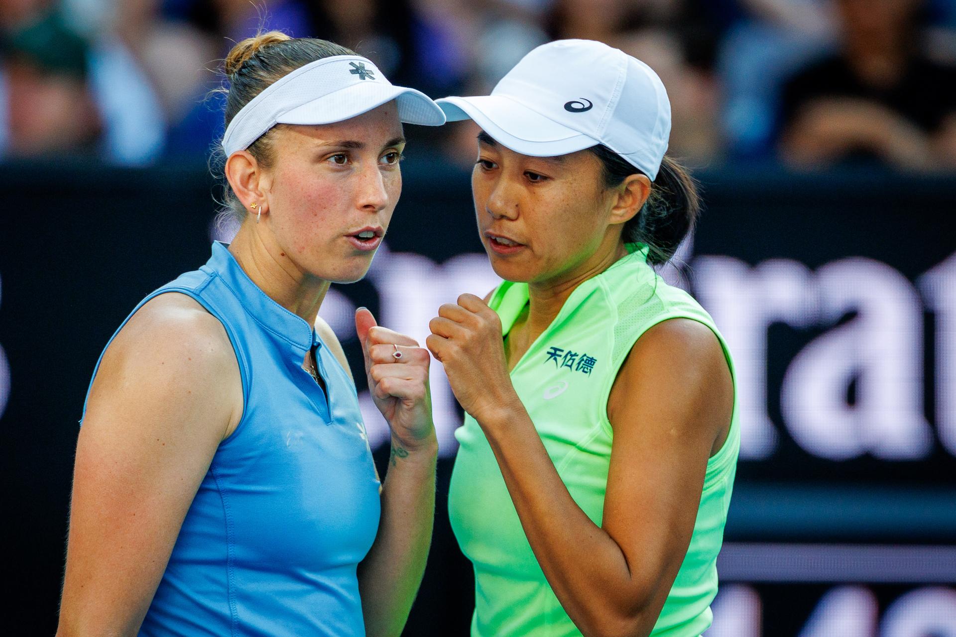 Belgian Elise Mertens and Chinese Tianhui Zhang pictured during during a second round match of Belgium-China's Mertens-Zhang pair against American-Canadian's pair Jovic-Mboko in the women doubles at the Australian Open, Melbourne Park, Melbourne on Sunday 25 January 2026. Mertens - Zhang won the game. BELGA PHOTO PATRICK HAMILTON  --- BENELUX ONLY   ---