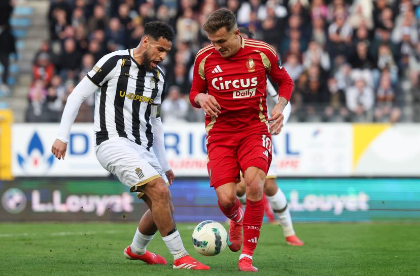 Standard's Dennis Ayensa and Charleroi's Adem Zorgane fight for the ball during a soccer match between Sporting Charleroi and Standard de Liege, Sunday 06 April 2025 in Charleroi, on day 2 (out of 10) of the Europe Play-offs of the 2024-2025 'Jupiler Pro League' first division of the Belgian championship. BELGA PHOTO VIRGINIE LEFOUR